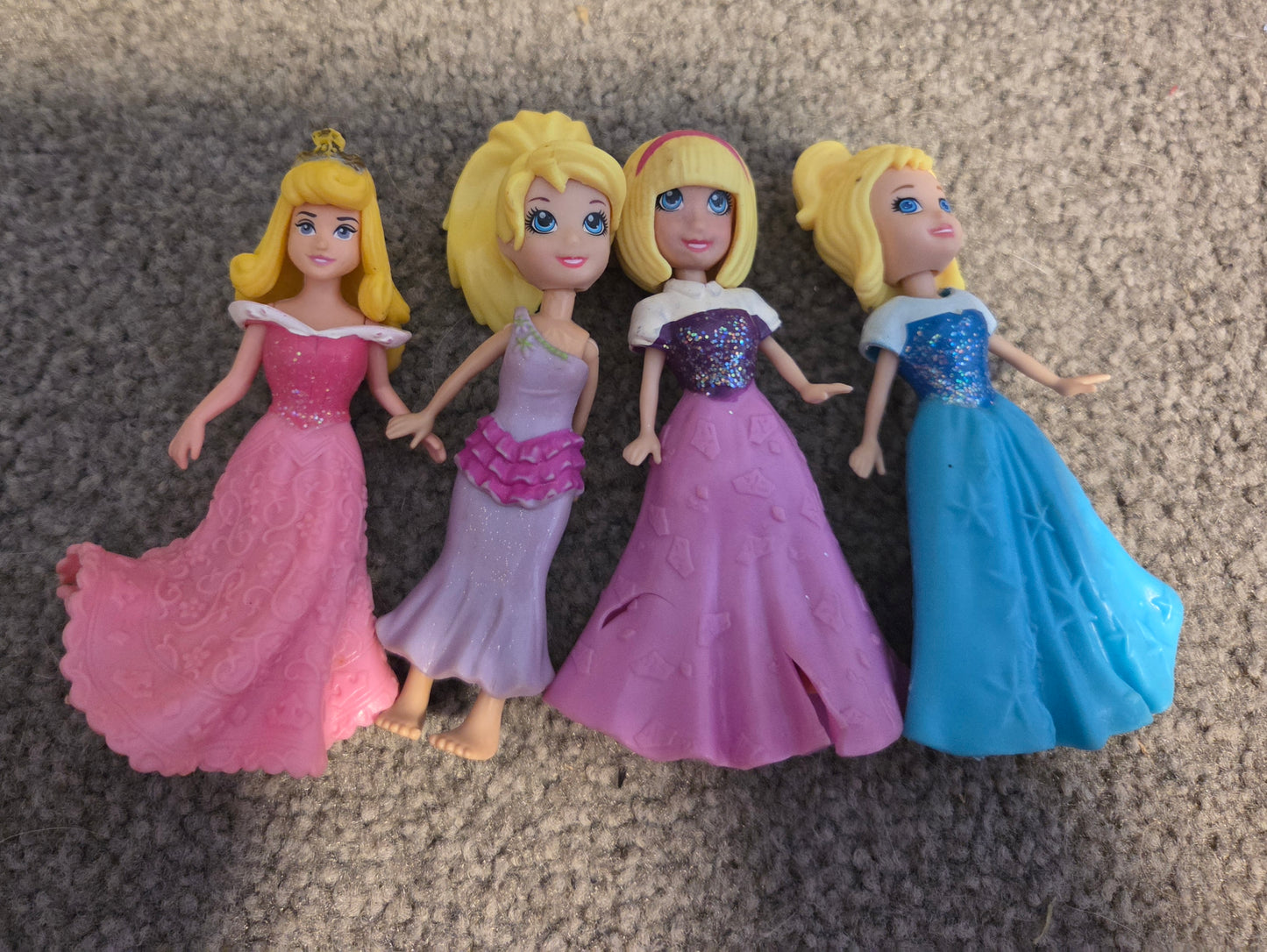 Princess and polly pocket style dolls with rubber dresses