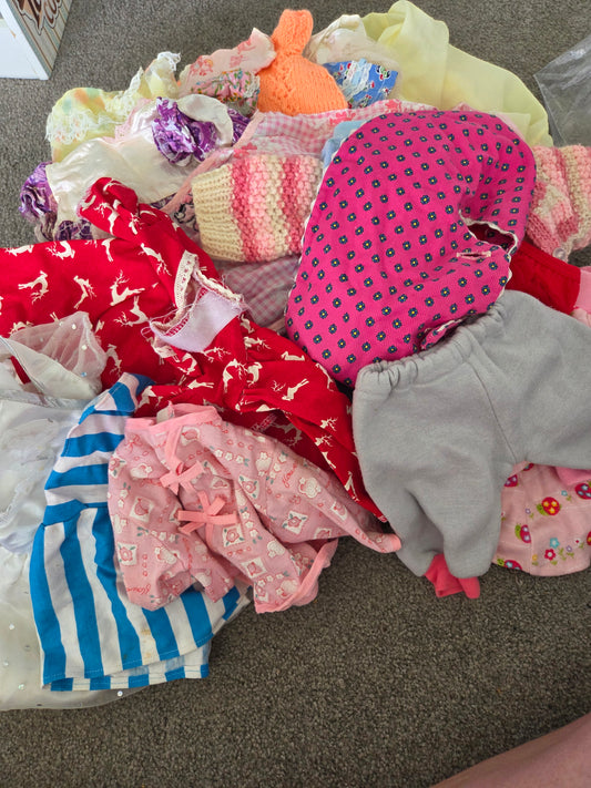 Selection of dolls clothes for approx 21cm doll