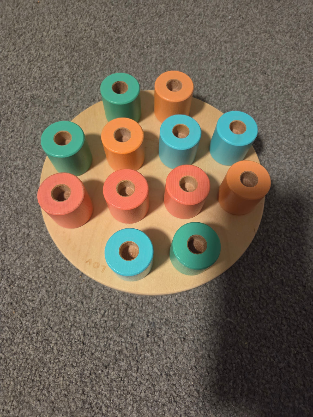 Lovevery wooden stacking peg board