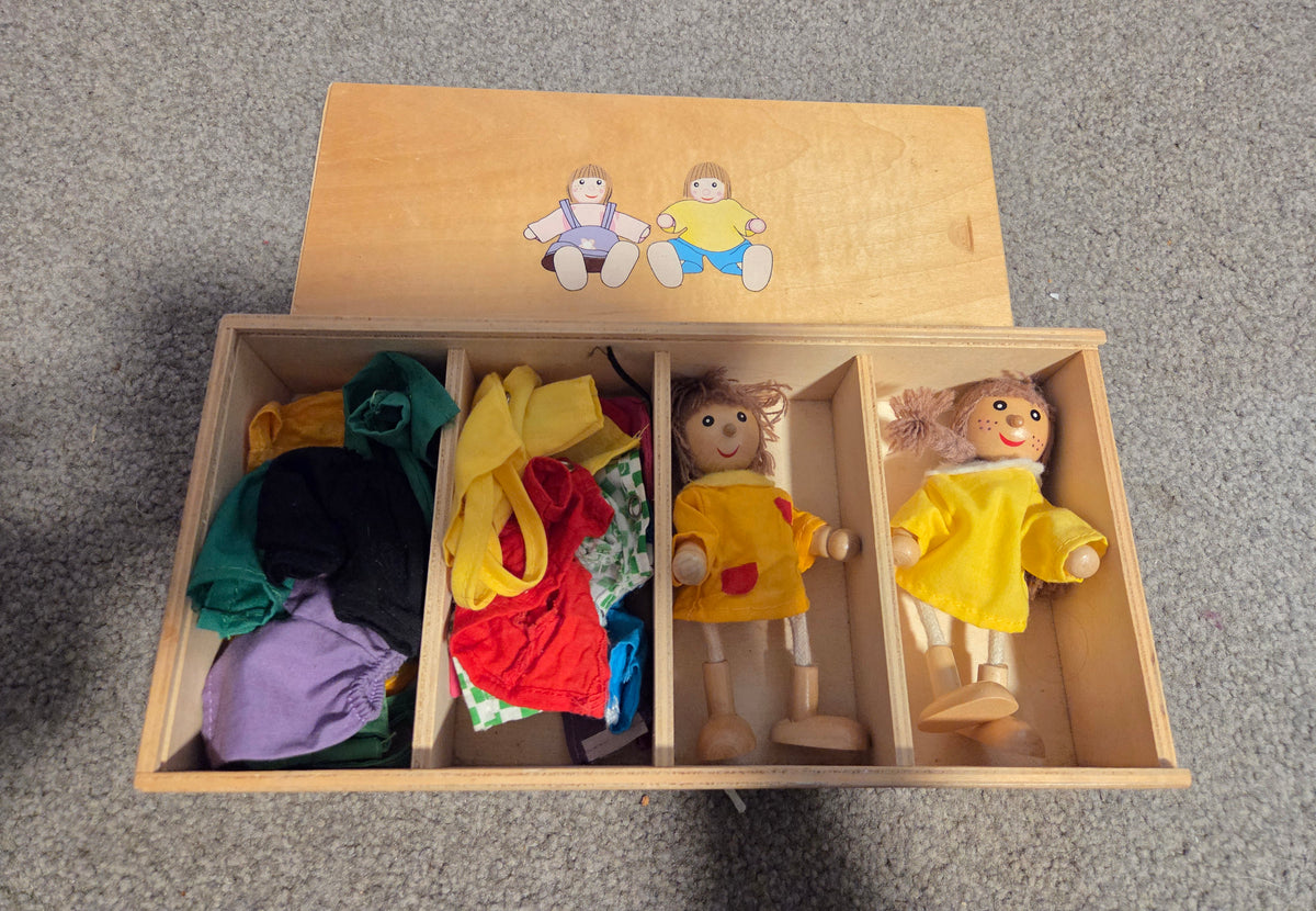 Wooden pose able dress up dolls in box